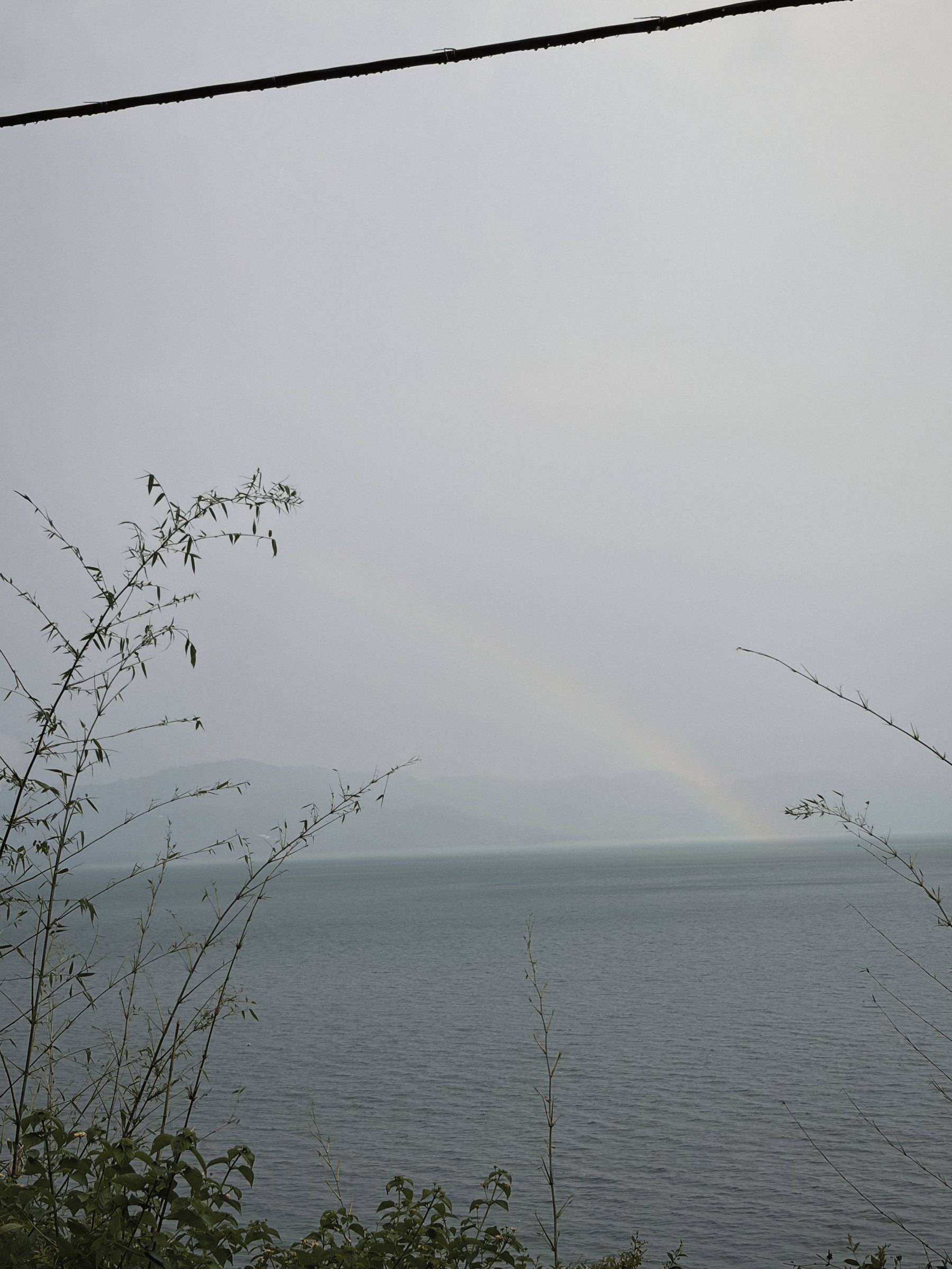 A rainbow that barely stayed for the photograph.